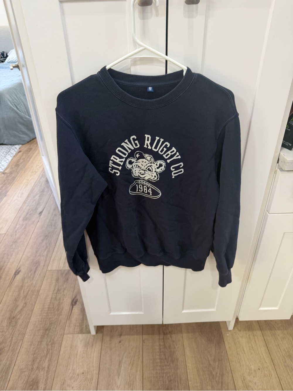 Uniqlo Navy Crewneck Sweatshirt with Rugby Graphic